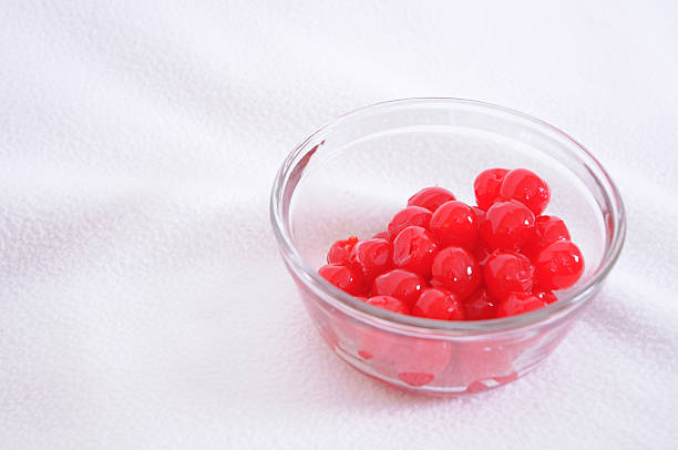 small bowl of cherries stock photo