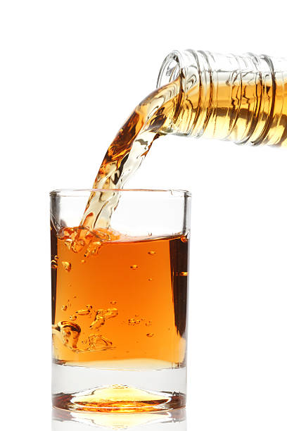 istock whiskey being poured into a glass 153494965