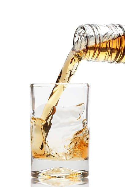 istock whiskey being poured into a glass 153494966