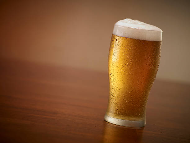 pint of Beer On a Bar stock photo