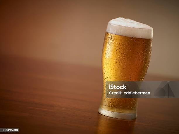 Pint Of Beer On A Bar Stock Photo - Download Image Now - Alcohol - Drink, Bar - Drink Establishment, Beer - Alcohol
