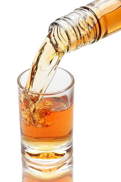istock whiskey being poured into a glass 153495031