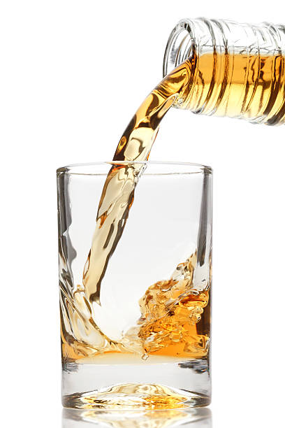 istock whiskey being poured into a glass 153495053