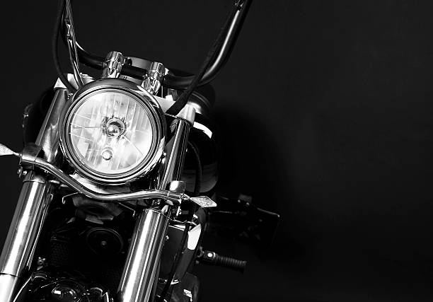 The headlights of a motorcycle Motorcycle Detail on Black Background motorcycle photos stock pictures, royalty-free photos & images