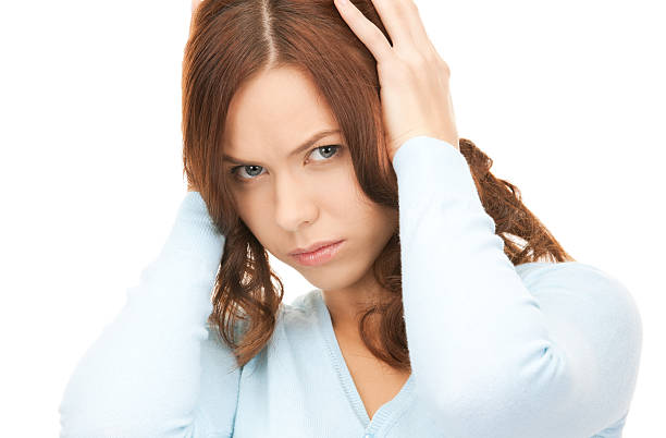 istock woman with hands on ears 153495939