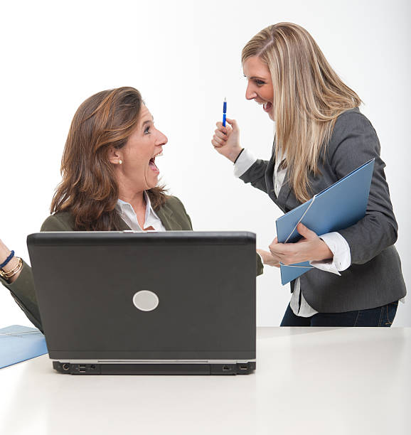 Happy time at the office 2 happy women at the office 40âs stock pictures, royalty-free photos & images