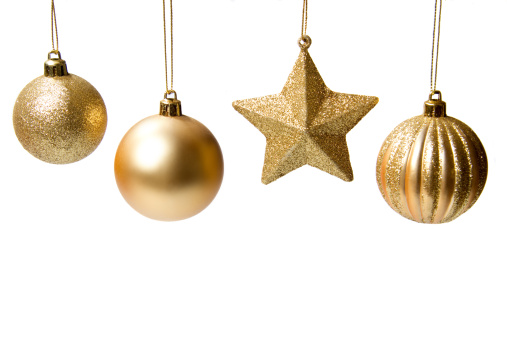 Gold Christmas decorations in different shapes isolated on a white background