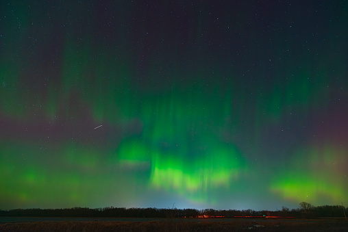 After an incredible display of aurora pillars, the green glow of smaller pillars filled the sky.