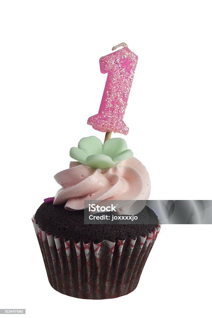 Mini cupcake con candela di compleanno per un anno - Foto stock royalty-free di Bianco