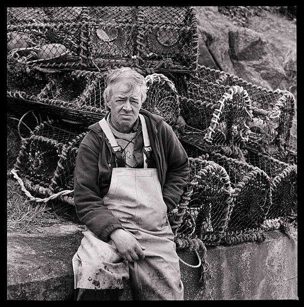 Fisherman with lobster pot creels