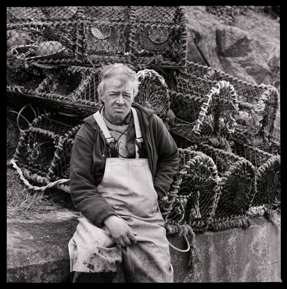 Scottish fisherman in North Uist, Outer hebrides with lobster pots.