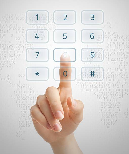 Virtual dialling Hand dialling on holographic keypad using touch screen interface. dialling phone stock pictures, royalty-free photos & images