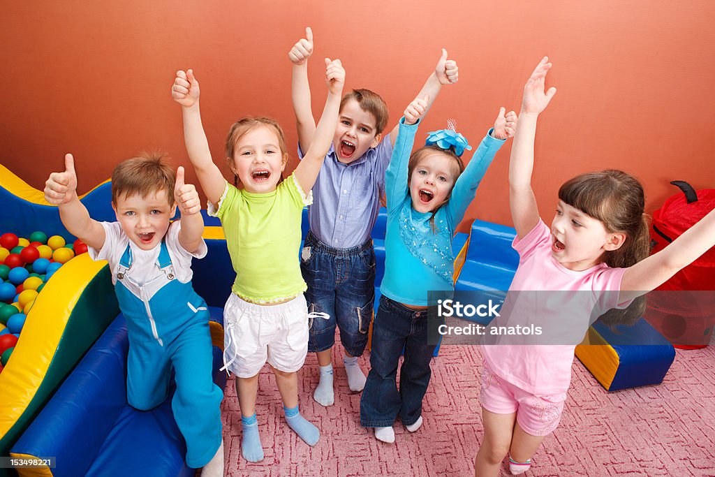 Shouting kids Group of shouting kids with hands up Child Stock Photo