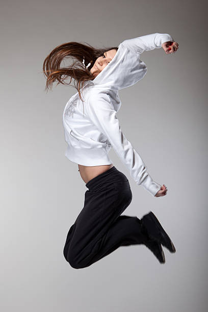 istock attractive jumping woman 153498950