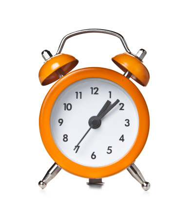 Orange Alarm Clock on white background