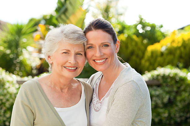 istock Mother with her daughter looking at the camera 153499284
