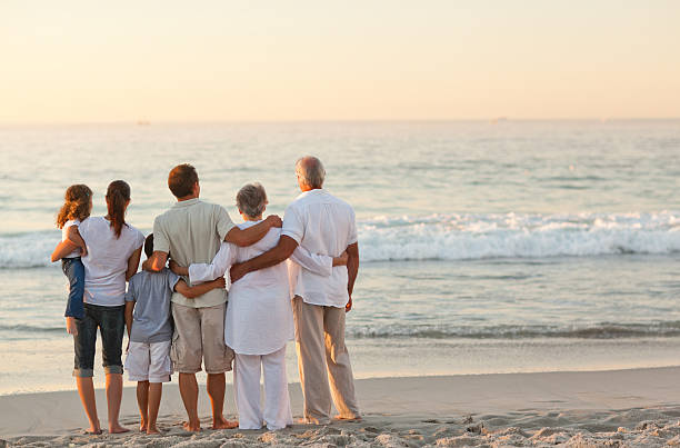 istock Beautiful family at the beach 153499297