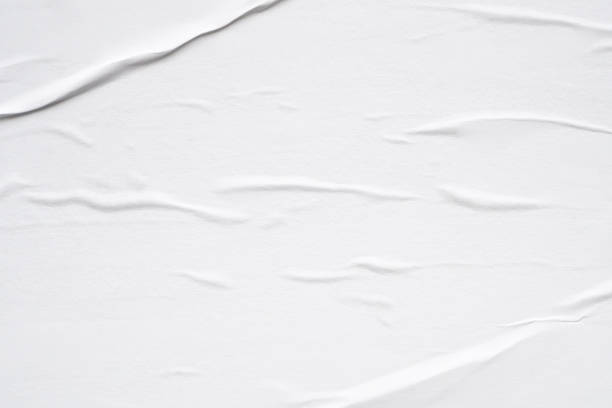 istock White blank crumpled and creased paper poster texture background 1535006024