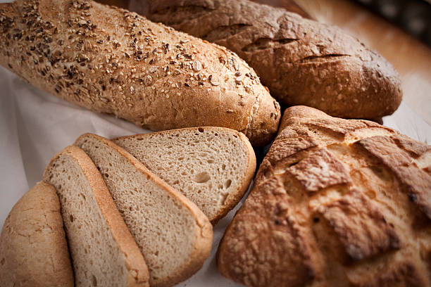 White Black Seed Bread and slices composition stock photo