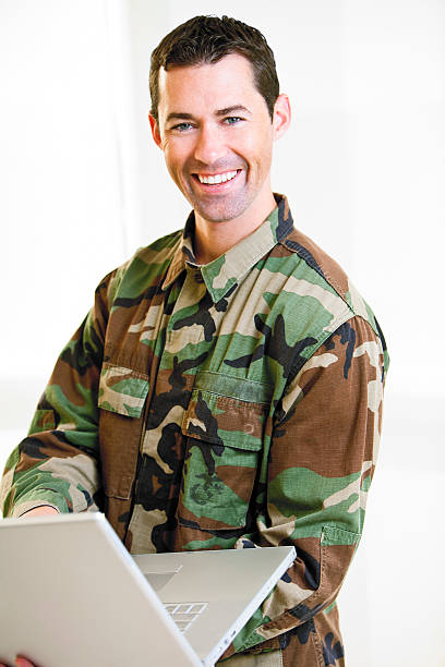istock White male in army uniform on lap top 153501106