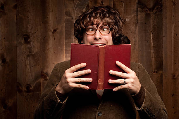 istock Man with wig, glasses, and book wearing jacket 153501155