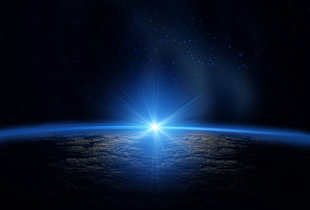 istock Sun emerging over the curvature of the earth from space  153502206