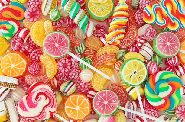 mixed colorful fruit bonbon - candy stok fotoğraflar ve resimler