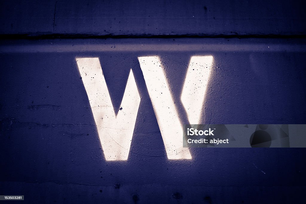 Stenciled W The letter W stenciled on the side of a train car. Alphabet Stock Photo