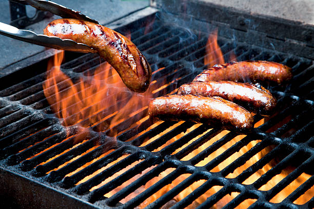 grilling'brats - sausage bratwurst barbecue grill barbecue imagens e fotografias de stock