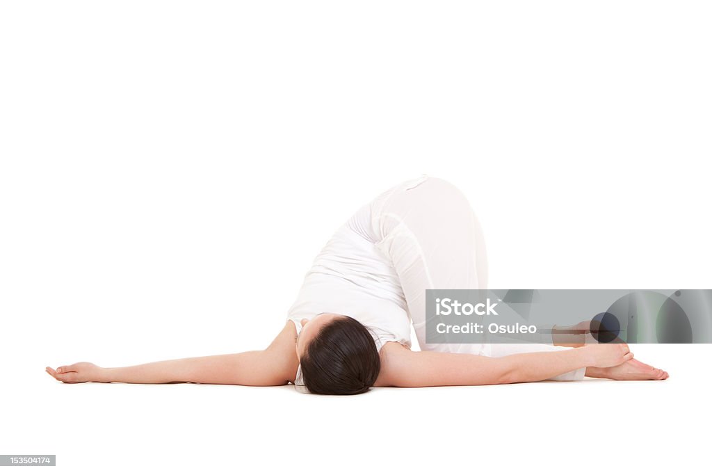 Jeune femme faisant yoga exercices - Photo de Adulte libre de droits