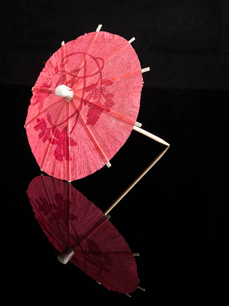 Paper umbrella with reflection stock photo