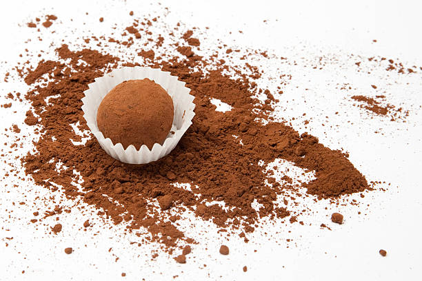 istock Chocolate truffle on white with cacao 153504790