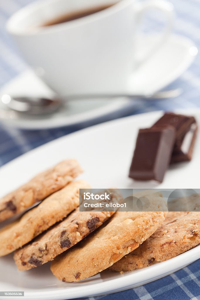 Peanut cookies. Peanut cookies with chocolate and cup of coffee or tea. Backgrounds Stock Photo