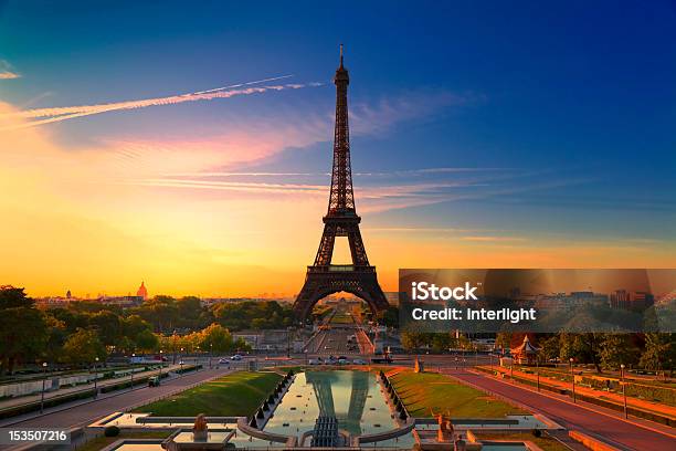 The Eiffel Tower In Paris France At Dawn Stock Photo - Download Image Now - Eiffel Tower - Paris, Architecture, Blue