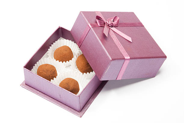 istock Chocolate truffles in little box 153507962