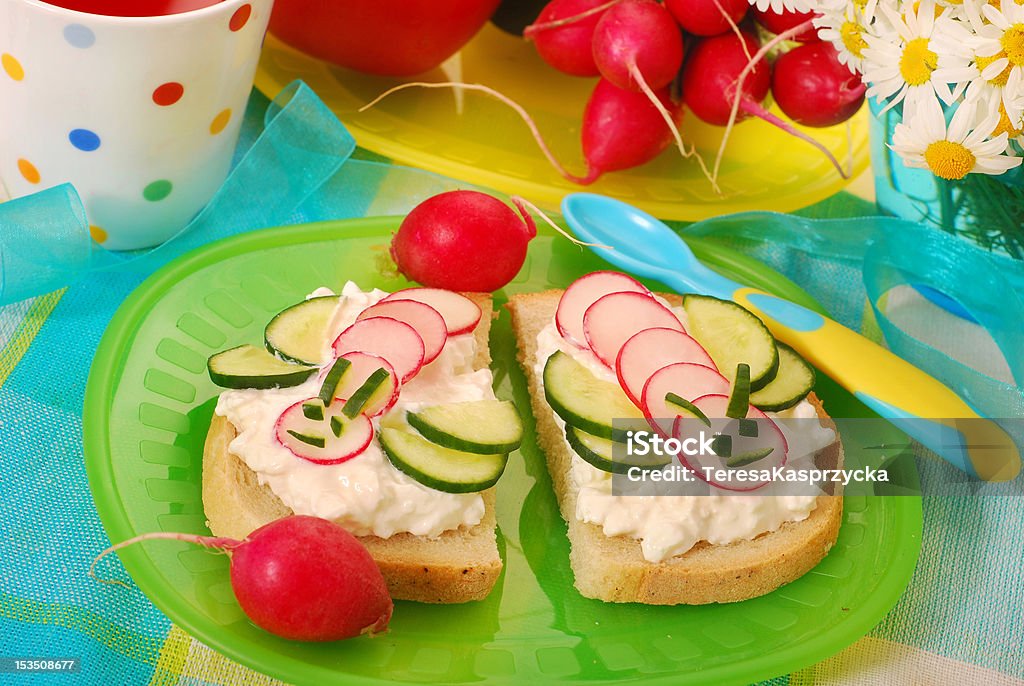 healthy breakfast for child healthy breakfast for child with cottage cheese,radish and cucumber in bee shape Bee Stock Photo