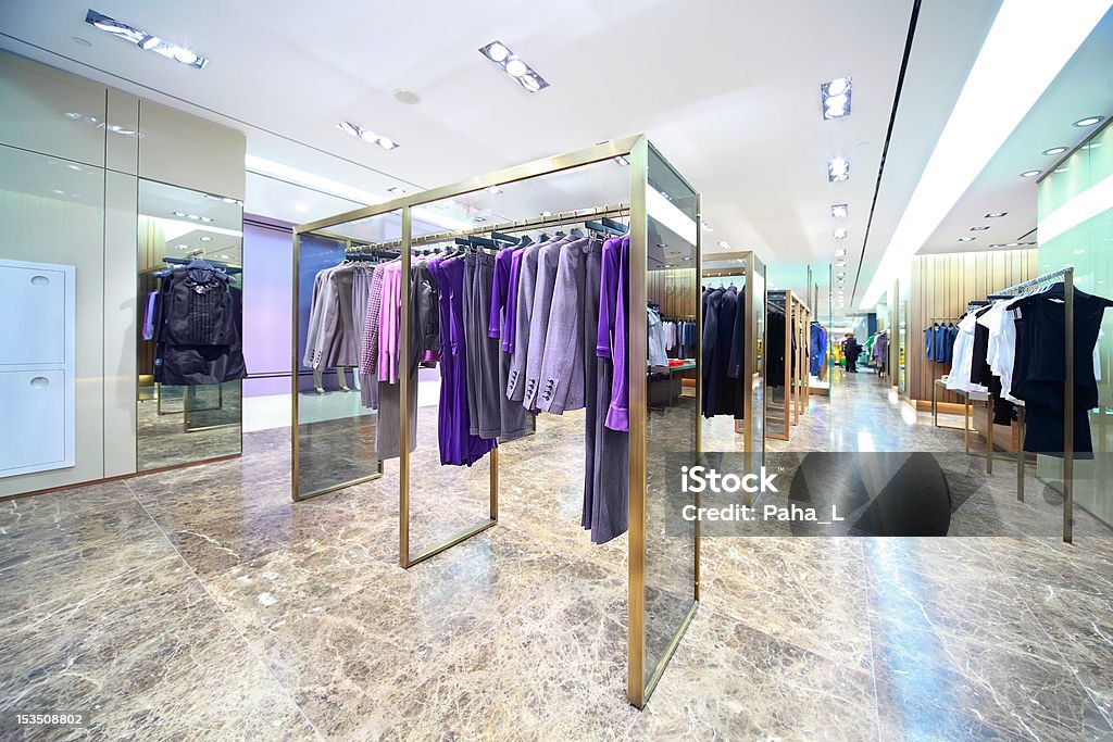 Kleider und Blusen, Jacken und Anzüge im shop von Frauen Kleidung - Lizenzfrei Anzug Stock-Foto
