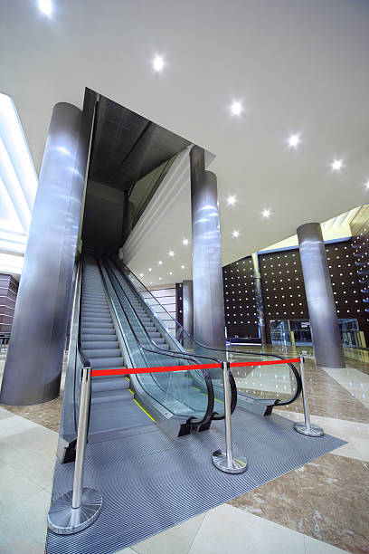 istock Escalator in large hall which is closed barrier 153509041