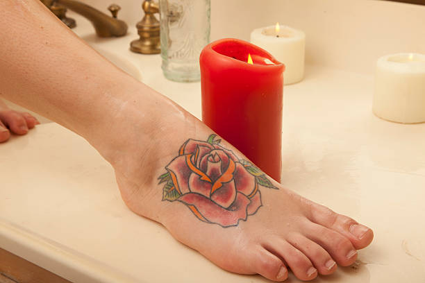 istock Sexy Tattoo Foot 153509047