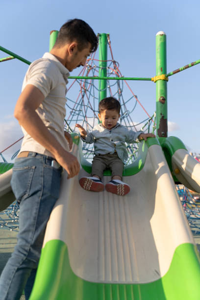 istock Father and son having fun time outside. 1535092313