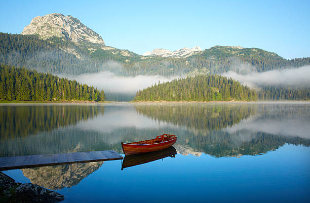 istock Landscape with mountains, lake and boat 153509261