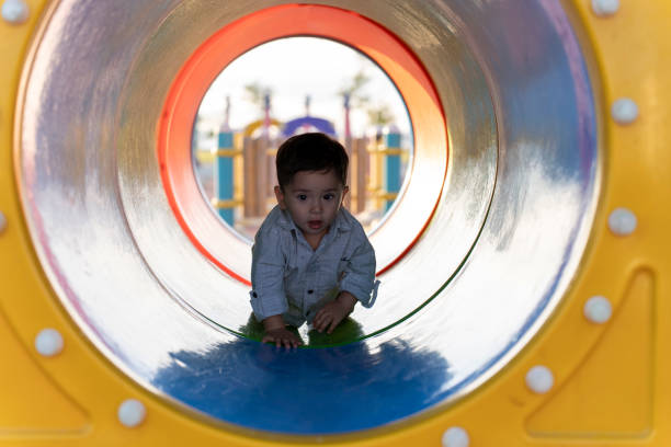 istock Boy having fun on the playground. 1535094446