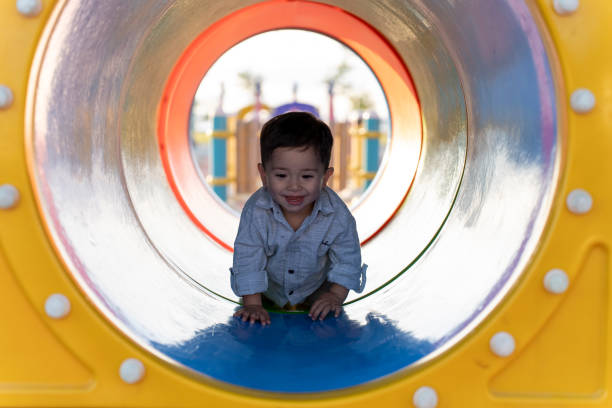 istock Boy having fun on the playground. 1535094448