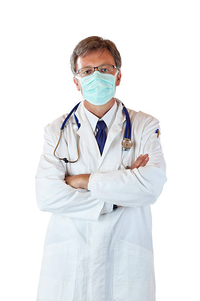 Elderly doctor with mouthguard to prevent virus infection stock photo
