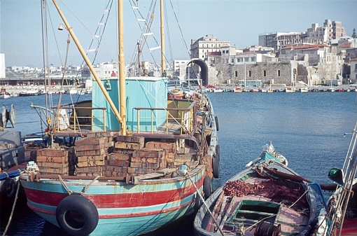 Heraklion, Crete, 1975. The port of Heraklion with fishing boats and adjacent buildings.