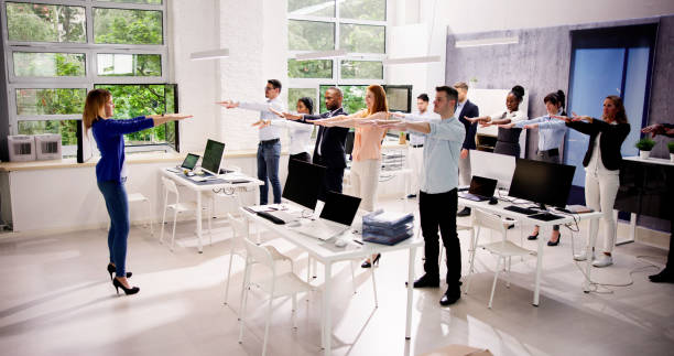 istock People Doing Corporate Yoga Workout 1535130995