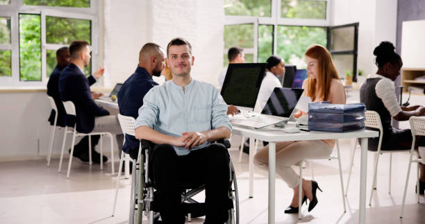istock Business People With Disability In Office Workplace 1535131531