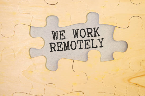 istock laptop and sticker with the inscription work remotely 1535139169