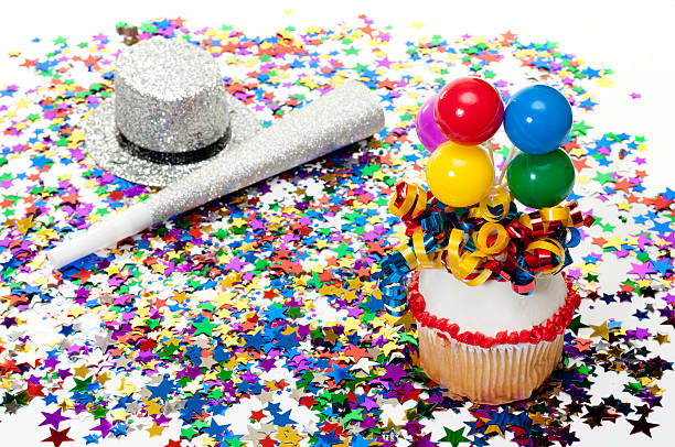 istock Cupcake, Confetti, Horn, and Hat at Party 153515431