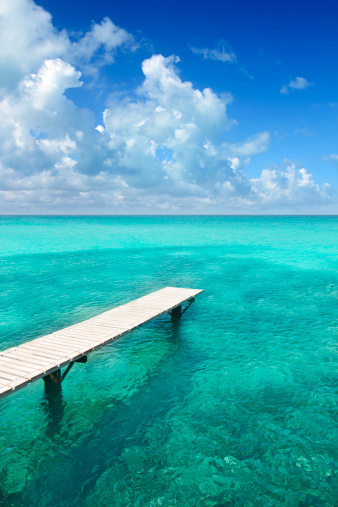 Illetes illetas beach with wooden pier and turquoise sea Formentera Balearic Mediterranean island